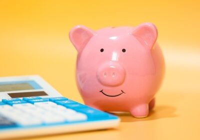 Piggy bank_400x298 Piggy bank next to calculator